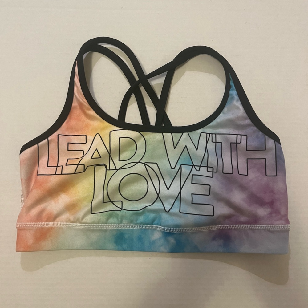 Like new! WITH Peloton strappy sports bra collab Pride medium Lead With Love 🌈
